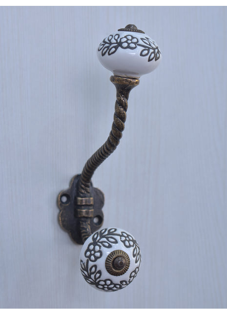Black Flower On White Ceramic Cabinet Knob With Metal Wall Hanger