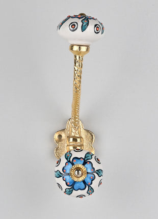 Turquoise Flower On White Knob Orange Embossed Design With Metal Wall Hanger