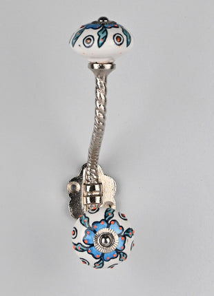 Turquoise Flower On White Knob Orange Embossed Design With Metal Wall Hanger