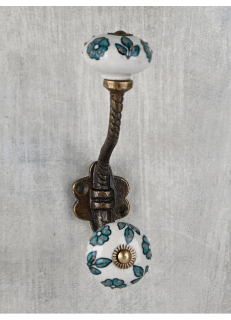 Teal Color Flowers And Petals On White Ceramic Knob With Metal Wall Hanger