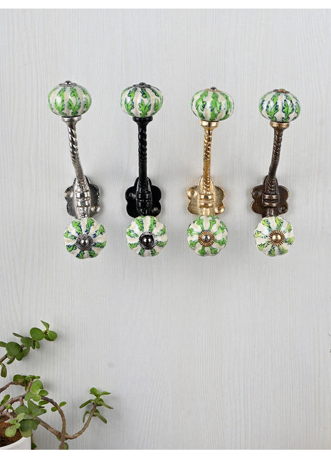 Green Leaves On White Melon Shaped Knob With Metal Wall Hanger