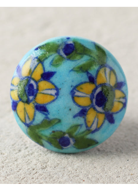 Turquoise Knob with Yellow and Blue Flowers and Green Leaves