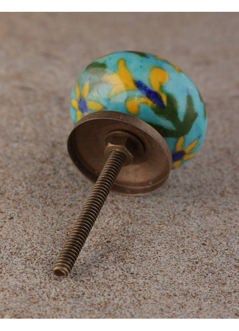 Yellow Flower And Green Leaf Design On Turquoise Bathroom Cabinet Knob