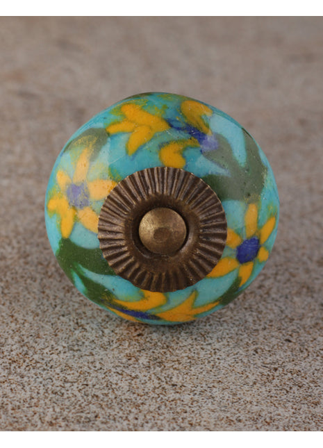 Yellow Flower And Green Leaf Design On Turquoise Bathroom Cabinet Knob