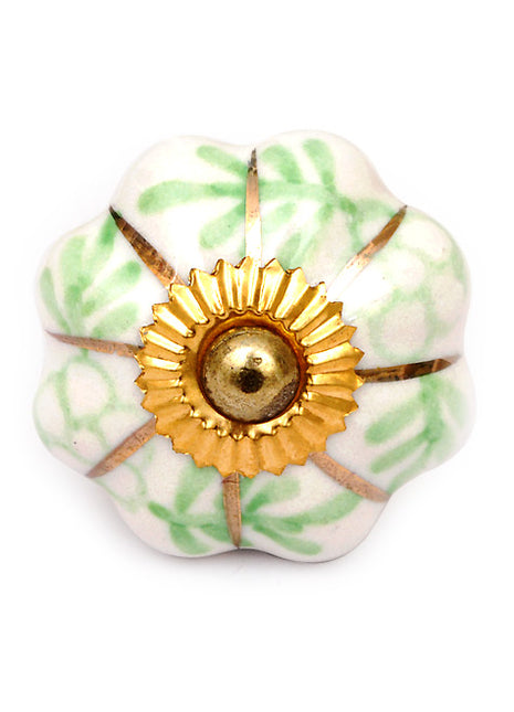 Elegant White Kitchen Cabinet Knob With Golden And Green Design