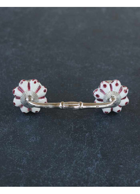 White Cabinet Pull With Maroon Floral Design