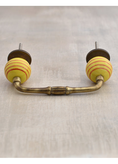 Yellow Round Ceramic Wardrobe Pull With Spiral Red Design