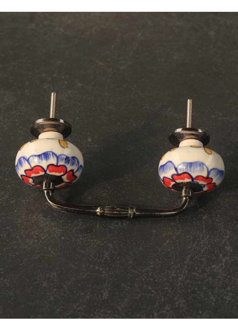 White Base Cabinet Pull With Red And Blue Floral Design