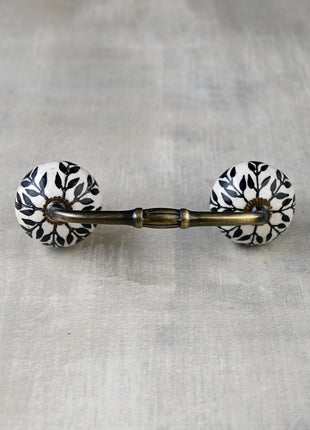 Stylish White Ceramic Kitchen Cabinet Pull With Black Leaves