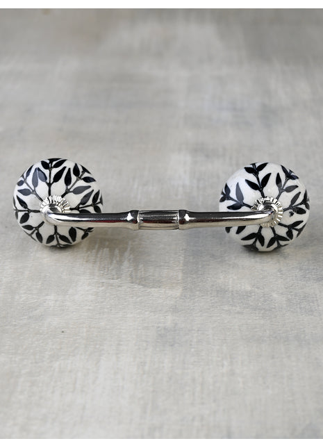 Stylish White Ceramic Kitchen Cabinet Pull With Black Leaves
