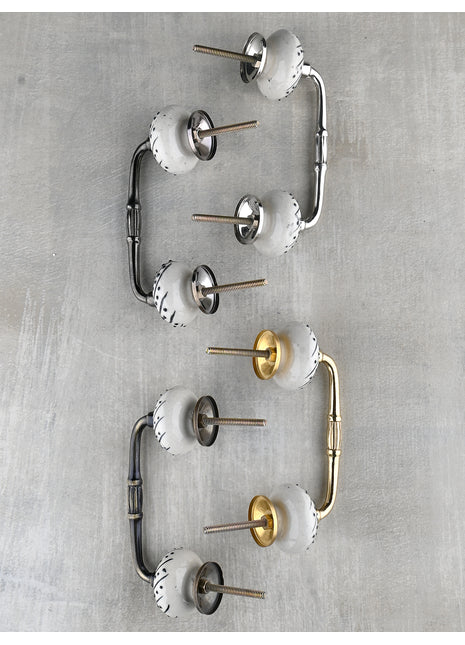 White Ceramic Kitchen Cabinet Pull With Black Design