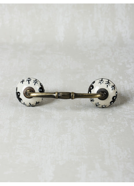 Black Design On White Ceramic Pull