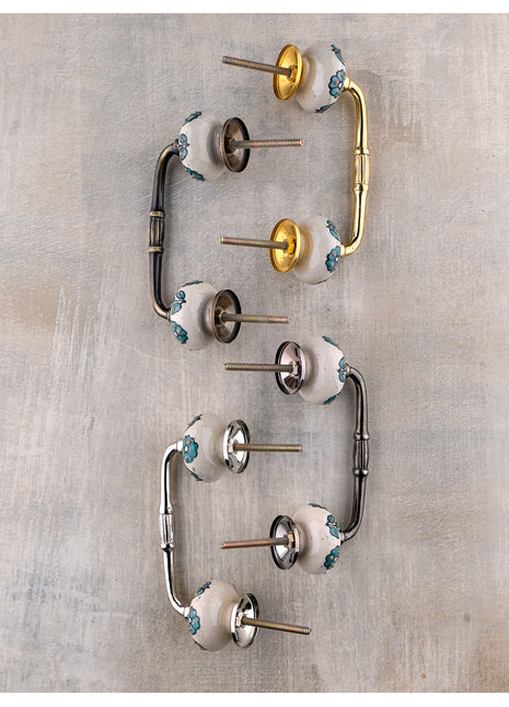 Teal Color Flowers And Petals On White Ceramic Cupboard Pull