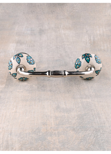 Teal Color Flowers And Petals On White Ceramic Cupboard Pull