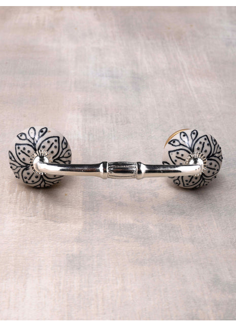White Ceramic Flower Shaped Drawer Pull With Black Print
