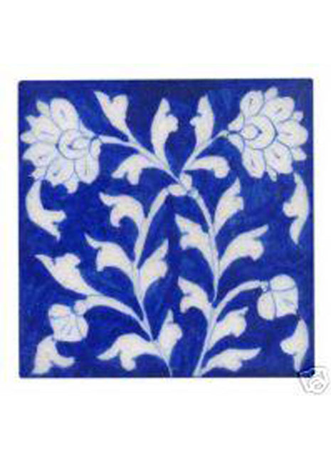 White flowers & leaves on blue tile (4x4)
