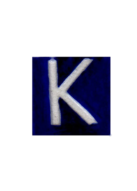 White K alphabet blue tile (2x2)