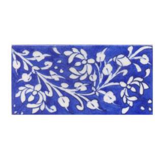  White leaves and flower with blue tile