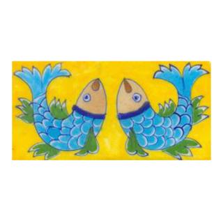 Two turqouise fish and yellow tile