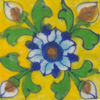 Blue, white , green flower on yellow tile