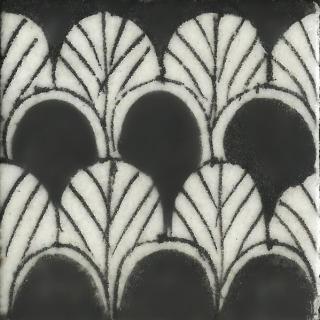 White Pattern On Black Base Tile