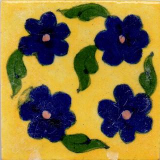 Blue Flowers and Green Leaves On Yellow Base Tile