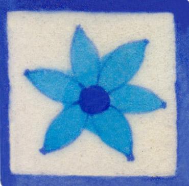 turquoise flower on white tile