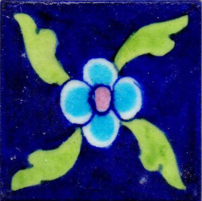 Single Turoise Flower With Green Leaves Design On Blue Tile