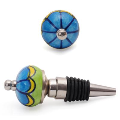 Turquoise and Green with line design wine bottle stoppers.